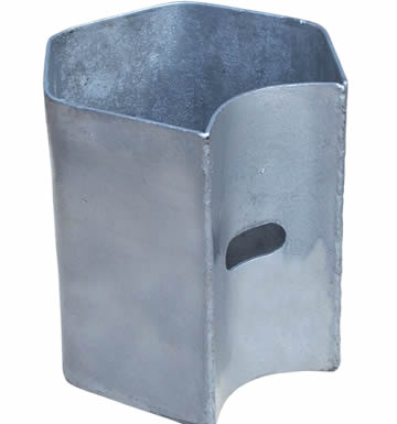 a silver galvanized guardrail offset block